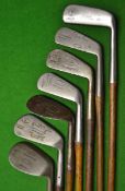 7x Assorted clubs including a Triumph cleek, a Spalding one iron, a Spade mashie, an Alex Aiken of