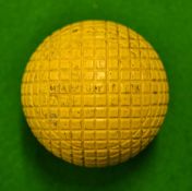 Rare yellow Maponite clearly stamped moulded mesh pattern golf ball â€“appears unused hence (VG)