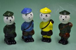 4x Carlton ware bone china Dunlop style caddy figures â€“ each wearing plus fours â€“ overall 3.5"