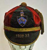 1937-38 College Rugby Cap â€“ six panel read dark green velvet cap with gold braid embroidered