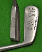 A Rivers/Zambra approach putter with shallow head stamped the `Scuffler` to the sole, and unusual
