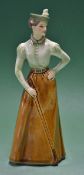 Goebel W Germany bone china figure of Vic lady golfer â€“ the base stamped with makers and artists