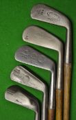 5x Various irons including a heavy musselback mashie, a flanged bottom mashie, with a Harrods mark