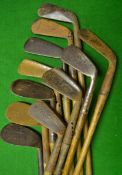 11x Various irons including an anti-shank Smiths model wing toed niblick, 2 x niblicks, a flanged