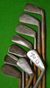 9x Assorted irons including a flanged sole mashie stamped `Scotty`, a niblick, several mid irons,