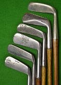 6x Assorted blade putters including an AH Scott patent showing the POWF `straight line` putter, JH