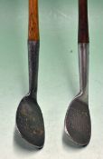 Heavy mashie niblick by the Fife Golf Company, t/w a flanged bottom niblick, both fitted with full