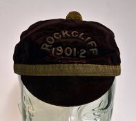 1901 Rockcliff Rugby Cap â€“ maroon cap with gold trim, no tassel, no recipient`s name, torn above