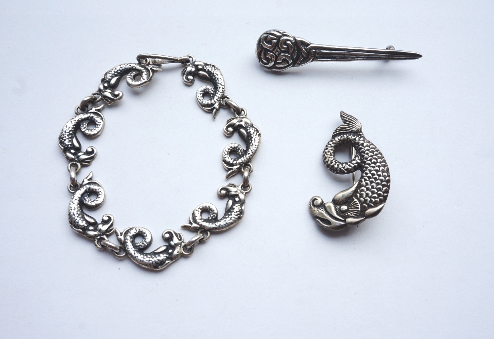 JOHN HART IONA SILVER BRACELET AND MATCHING BROOCH
of stylised fish design; plus a silver brooch