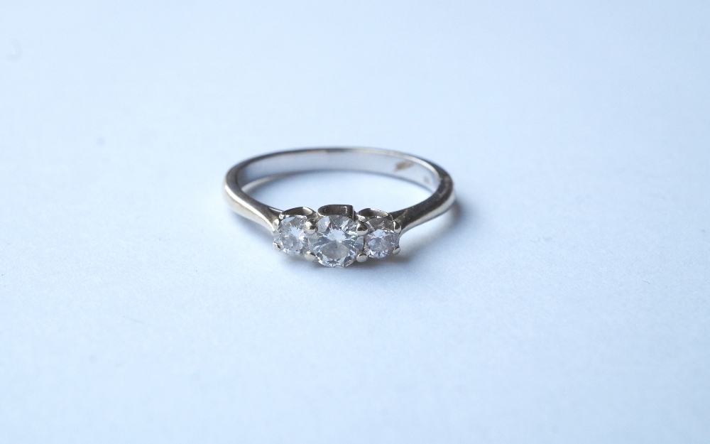 GRADUATED DIAMOND THREE STONE RING
on eighteen carat white gold shank, the diamonds totalling