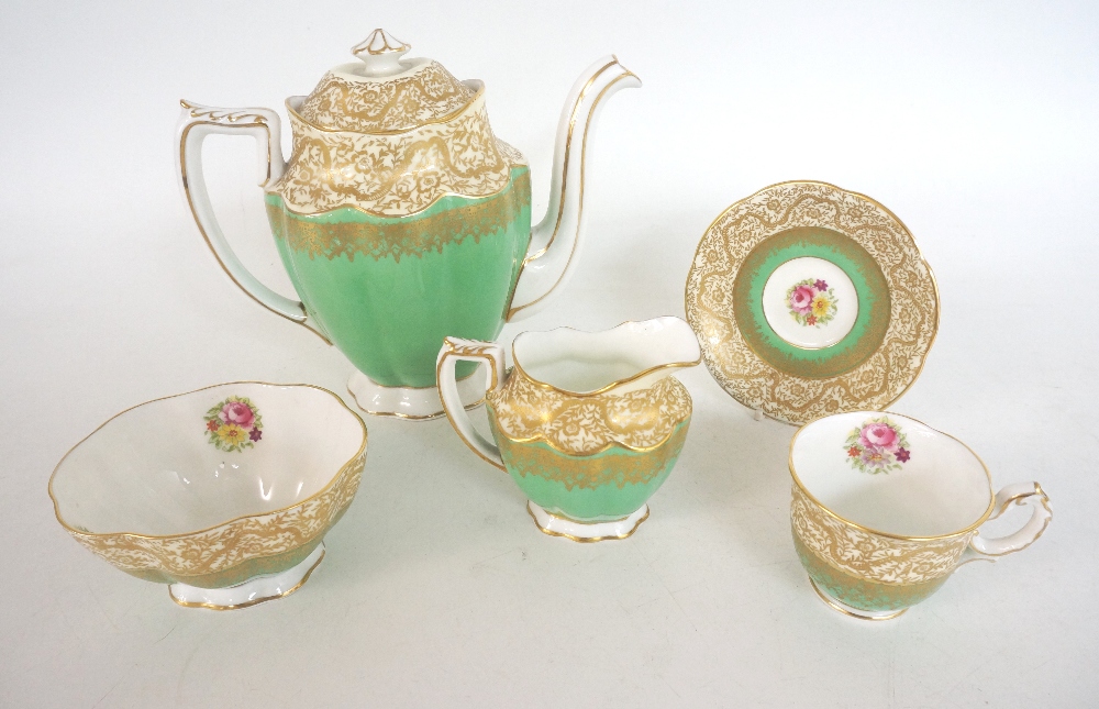 'BISHOP' CHINA COFFEE SET
with gilt and floral decoration, comprising coffee pot, six cups, six