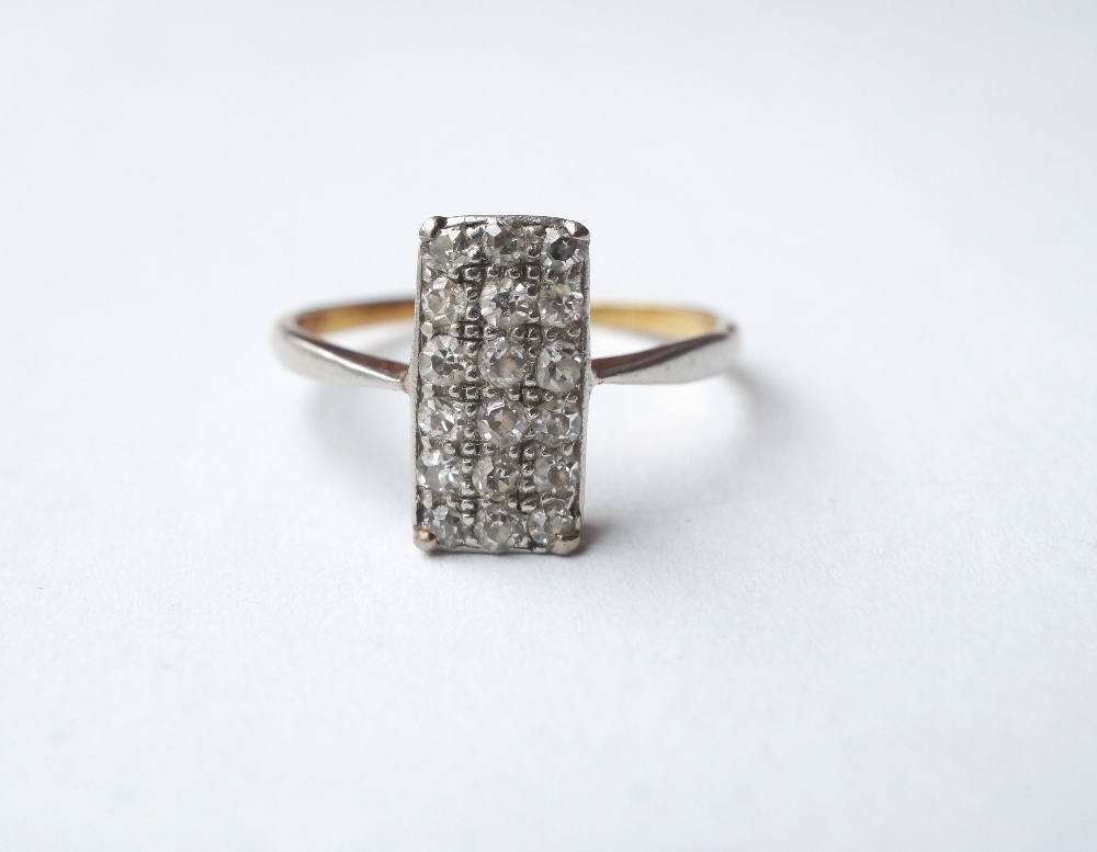 DIAMOND CLUSTER RING
the diamonds in rectangular setting totalling approximately 0.3cts, on unmarked
