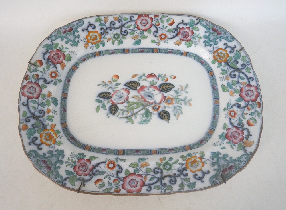 ENGLISH STONEWARE MEAT PLATE
of ovoid shape, decorated in the famile vert pattern, 49.5cm wide