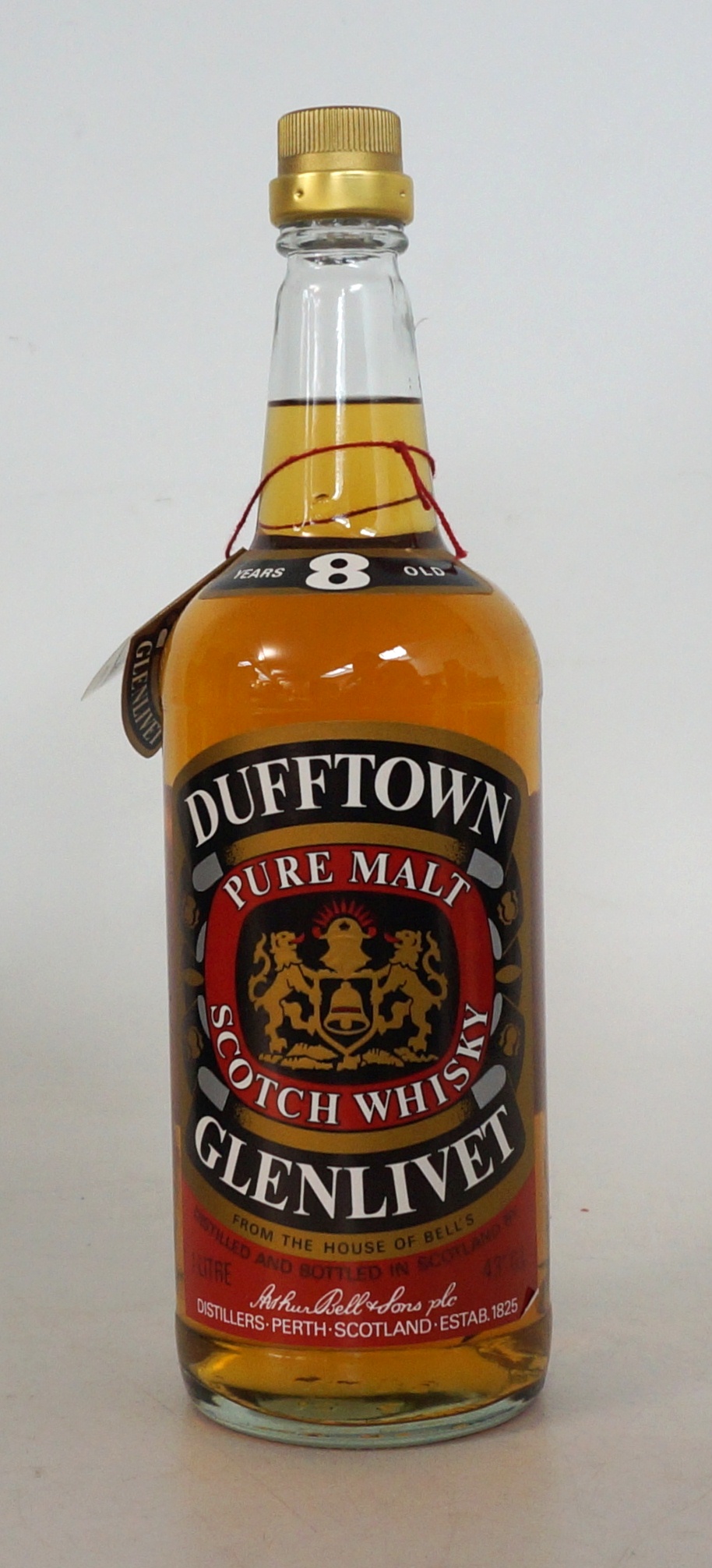 DUFFTOWN-GLENLIVET
1 bottle.  Dufftown Glenlivet 8 years old.  1 litre.  75 Proof.  Bottled by