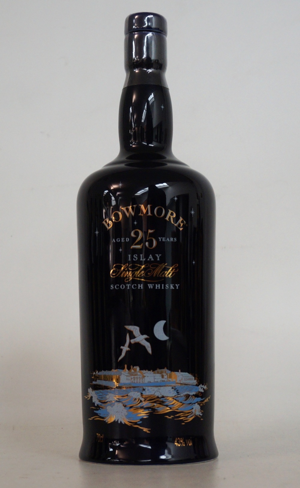 BOWMORE 25 YEARS OLD CERAMIC
1 bottle.  Bowmore 25 Years Old Islay Single Malt Scotch Whisky.