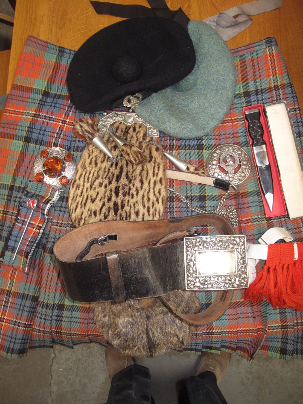 Scottish kilt, sporrans, bonnets,belts buckles, pipers kilt brooches, sgian dubh, scarves plus other