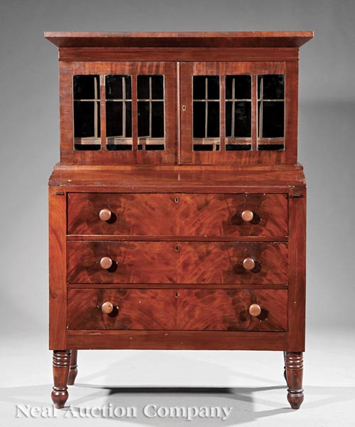 An American Federal Mahogany Secretary Desk, early 19th c., upper case with glazed doors enclosing