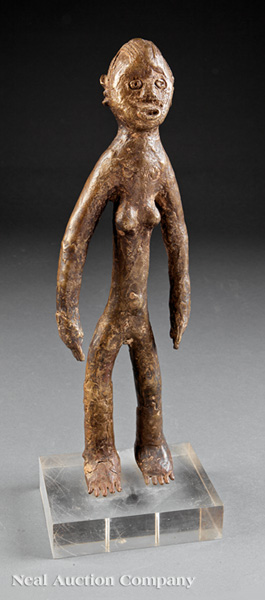 A Mossi Bronze Female Figure, Burkina Faso, modeled as an expressive standing nude, height 22 in.,