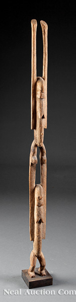 A Dogon Carved Wood Mythical Figure, Mali, carved in tiers as a female nude surmounted by another