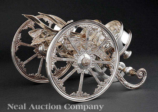 A Decorative Silverplate Double Cannon-Form Wine Carriage, with movable wheels and beaded bottle