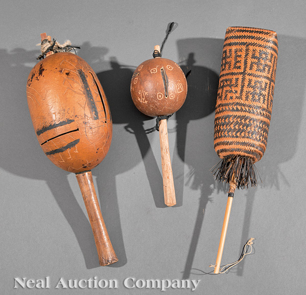 Three Shipibo Shaman`s Rattles, Peru, two with gourd bodies and wood shafts, height 20 in. and 14