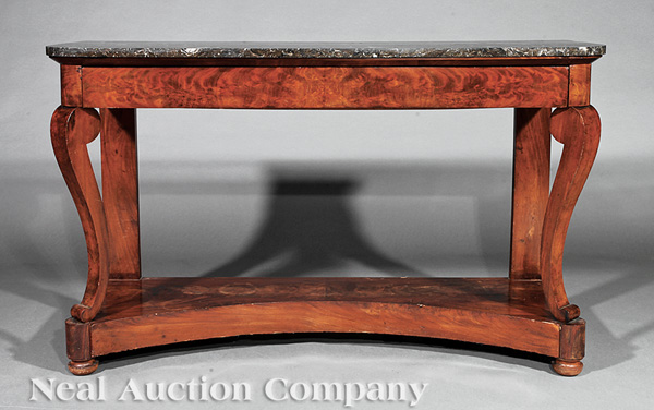 A Louis Philippe Mahogany Console Table, early 19th c., black marble top, frieze drawer, scroll