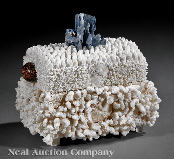 A Caribbean Coral Encrusted Box, 20th c., assorted white and blue varieties, polished shell handles,