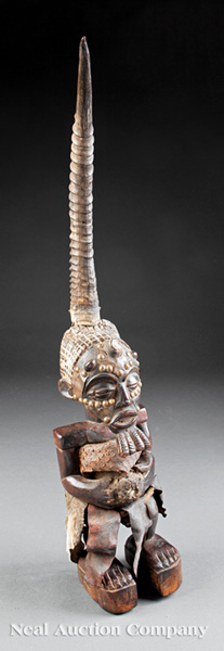 A Luba Hemba Carved Wood Figure, Democratic Republic of Congo, standing male nude with copper and