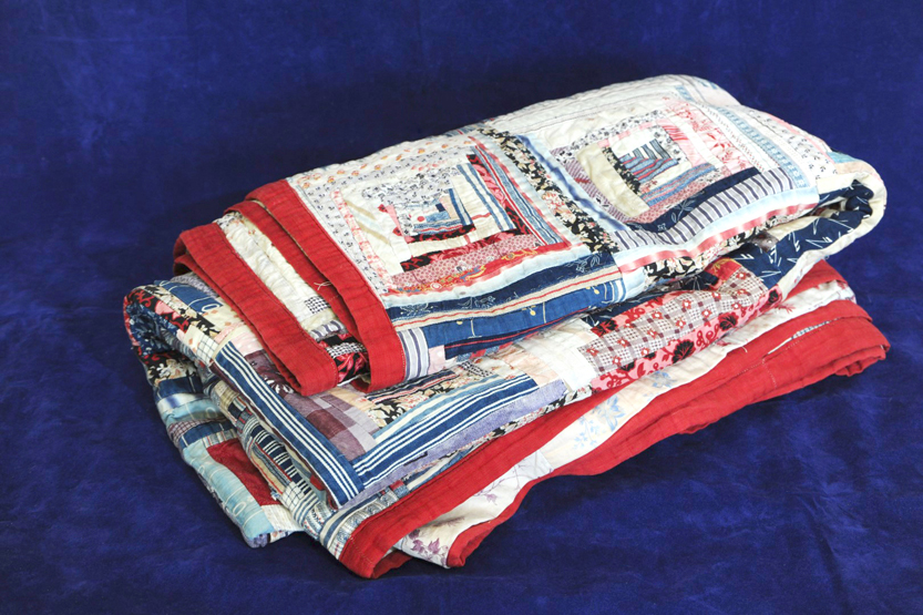 A 19th century patchwork quilt.