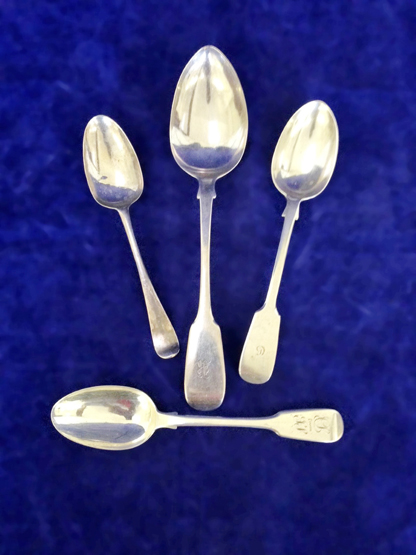 A George III silver table spoon, the handle initialled H. London 1808. Maker MS and a pair of