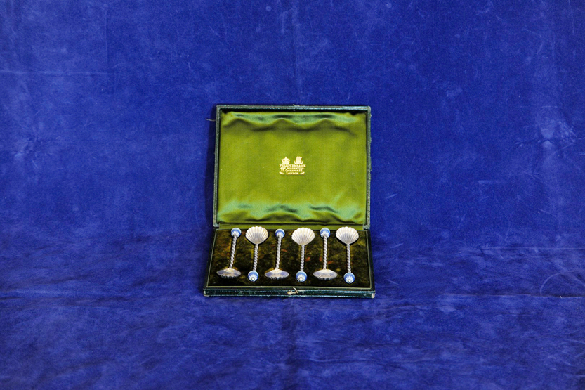 A set of six continental white metal teaspoons with Wedgwood style blue Jasperware finials, shell