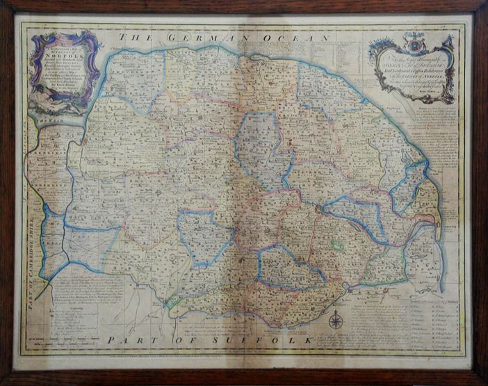 An Emmanuel Bower map of Norfolk with later colouring. 28¾ by 22¼ins. In an oak frame.