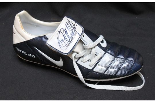 A Thierry signed Nike football boot with certificate of authenticity.