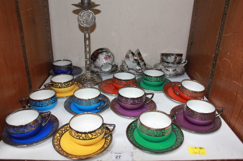 SECTION 27.  A Rosenthal porcelain set of ten different coloured coffee cups and saucers with