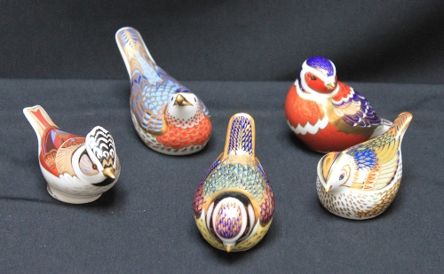 Five various Royal Crown Derby porcelain bird paperweights.