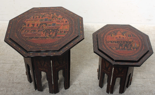 Two graduated 20th Century Oriental lacquer octagonal occasional tables, with polychrome painted