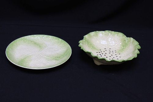 A Victorian Minton`s pottery cress draining dish on stand of leaf moulded form with green tinted