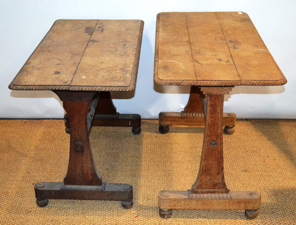 A near pair of early nineteenth century oak centre tables, the rectangular tops with gadroon carved
