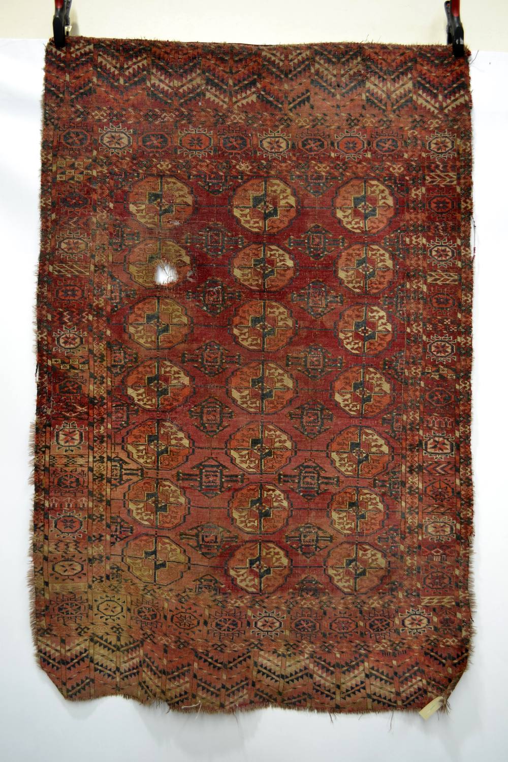 Two Tekke Turkmen rugs and an Ersari Turkmen chuval face, Turkmenistan and north east Afghanistan,