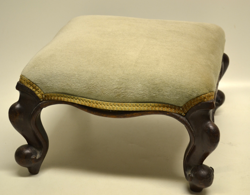 A Victorian walnut cabriole leg stool, with a stuffed over seat, 18in (46cm) and a Victorian foot