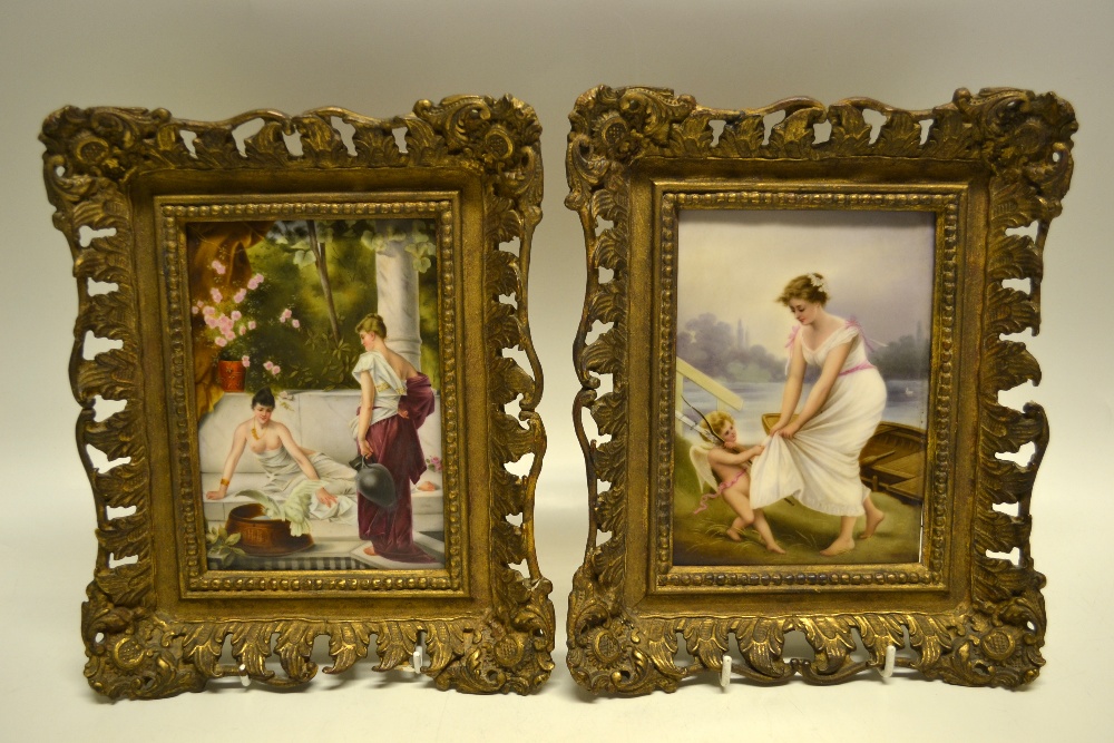 A pair of nineteenth century German porcelain hand painted plaques, of a young lady being pulled