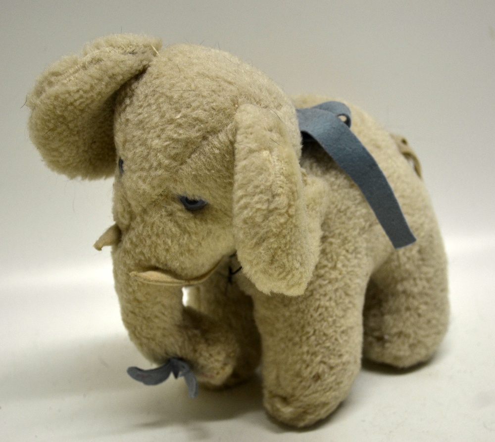 A 1930`s wool elephant, Ba Ba, with glass eyes. 8.5in 22cm. From the Estate of the Late Baron