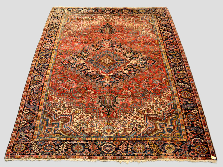 Heriz carpet, north west Persia, mid-20th century, 11ft. 11in. x 9ft. 1in. 3.63m. x 2.77m.