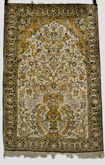 Qum silk prayer rug, south century Persia, mid-20th century 5ft. 4in. x 3ft. 7in. 1.63m. x 1.09m.