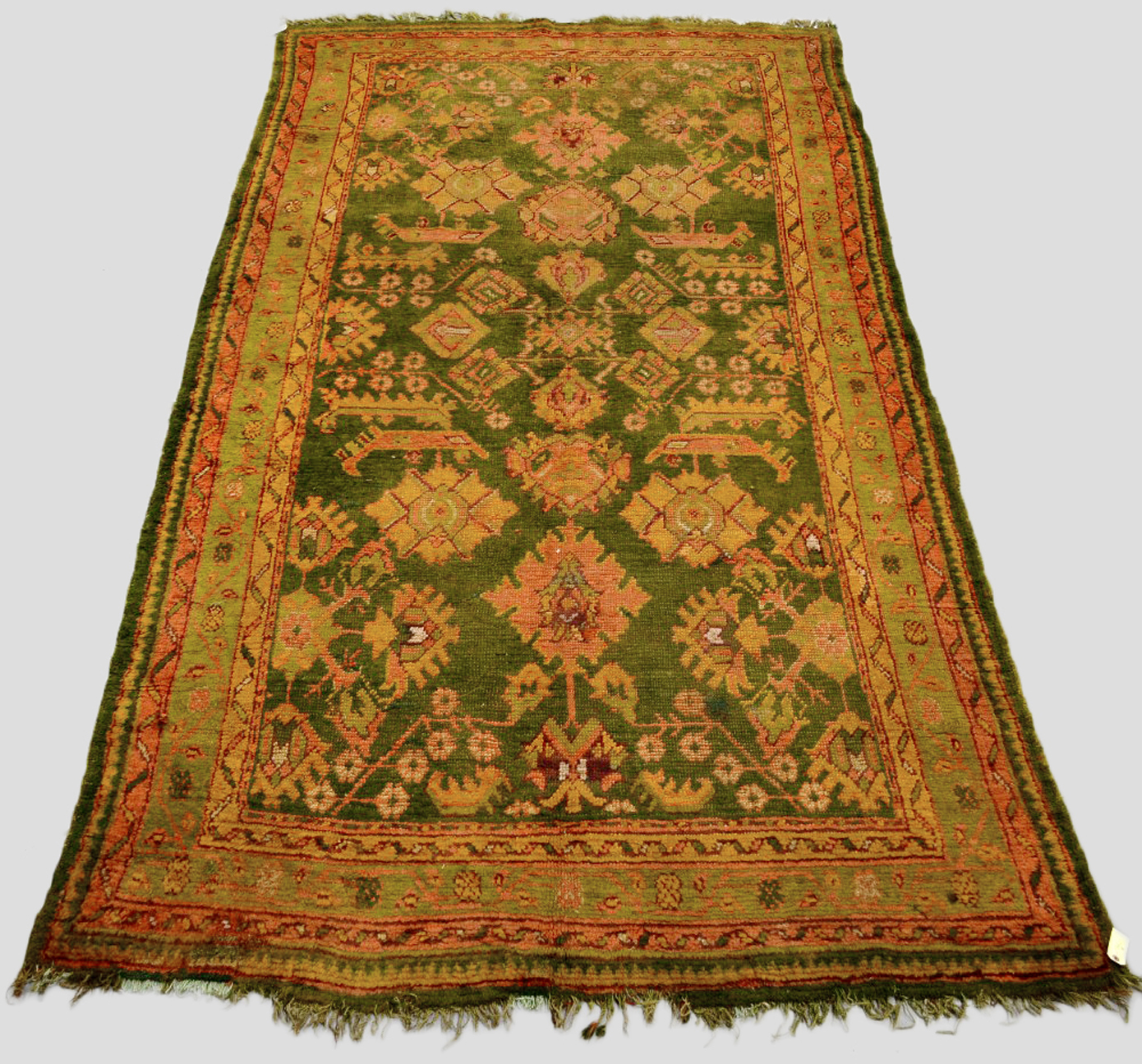 Attractive green ground Ushak carpet, west Anatolia, early 20th century, 11ft. 6in. x 6ft. 3in. 3.