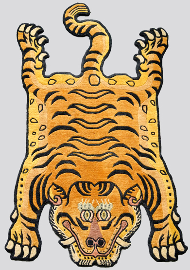 Nepalese `tiger` rug, 20th century, 6ft. x 3ft. 6in. 1.83m. x 1.07m.