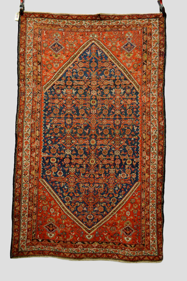 Malayer rug, north west Persia, about 1930-40s 6ft. 11in. x 4ft. 2in. 2.11m. x 1.27m. Overall even