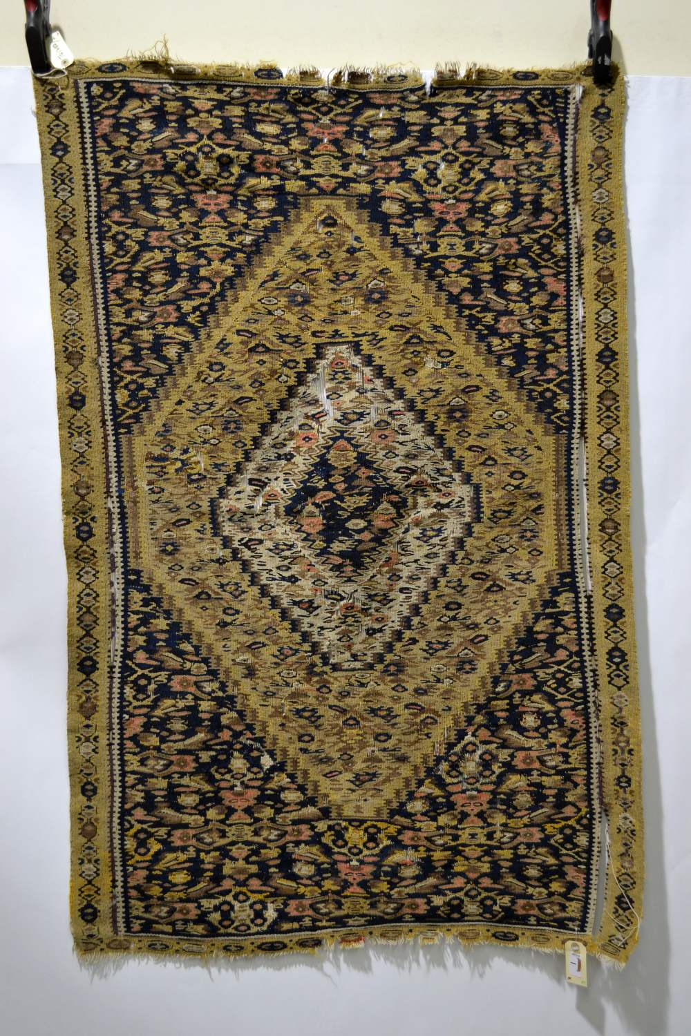 Senneh ghileem, north west Persia, about 1930-40s, 4ft. 7in. x 2ft. 11in. 1.40m. x 0.89m.