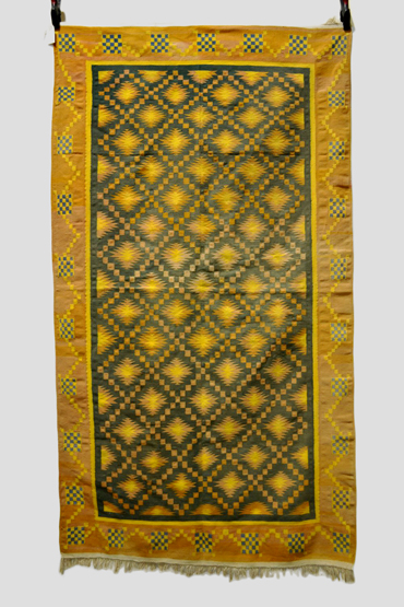 Dhurrie, north India, 20th century, 7ft. x 3ft. 11in. 2.13m. x 1.20m.