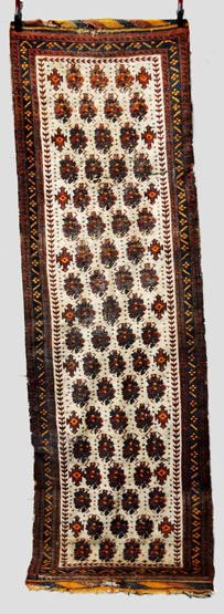Baluchi ivory field runner, Khorasan, north east Persia, early 20th century, 9ft. 10in. x 2ft. 11in.